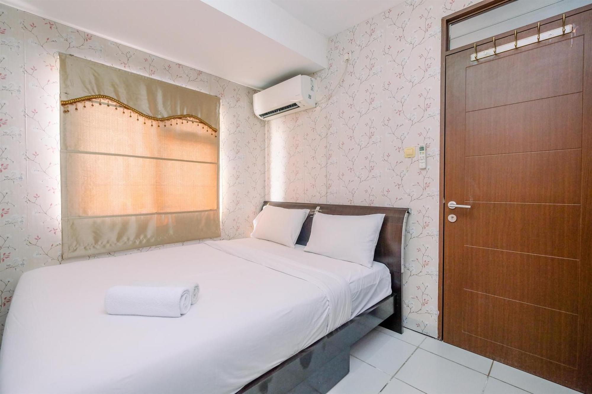 Apartemen Comfortable And Tidy 2br Lagoon Town Square By Travelio