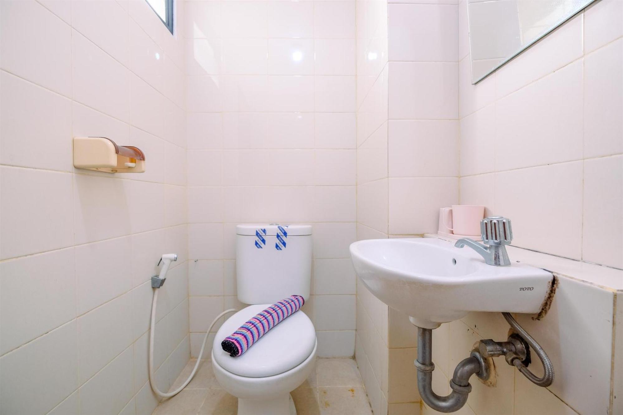 Apartemen Comfortable And Tidy 2br Lagoon Town Square By Travelio Bekasi
